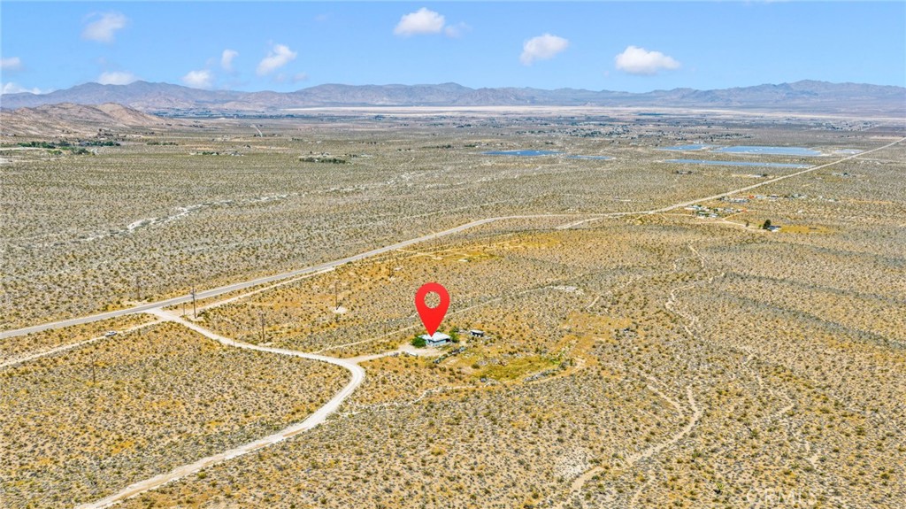 6909 Camp Rock Road Lucerne Valley, CA 92356 - Photo 11 of 11 a view of an ocean and a mountain view