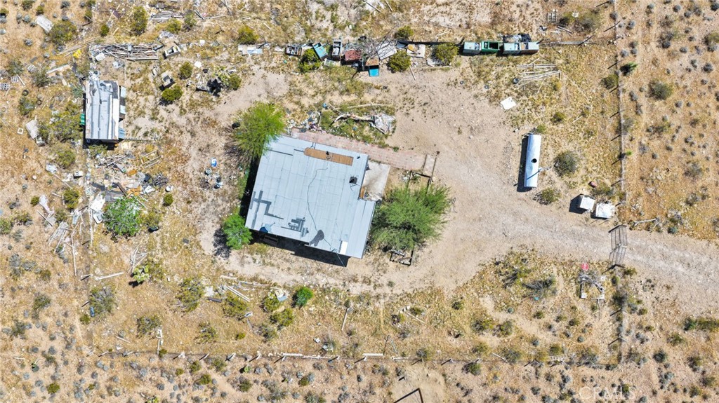 6909 Camp Rock Road Lucerne Valley, CA 92356 - Photo 8 of 11 an aerial view of a house with a yard