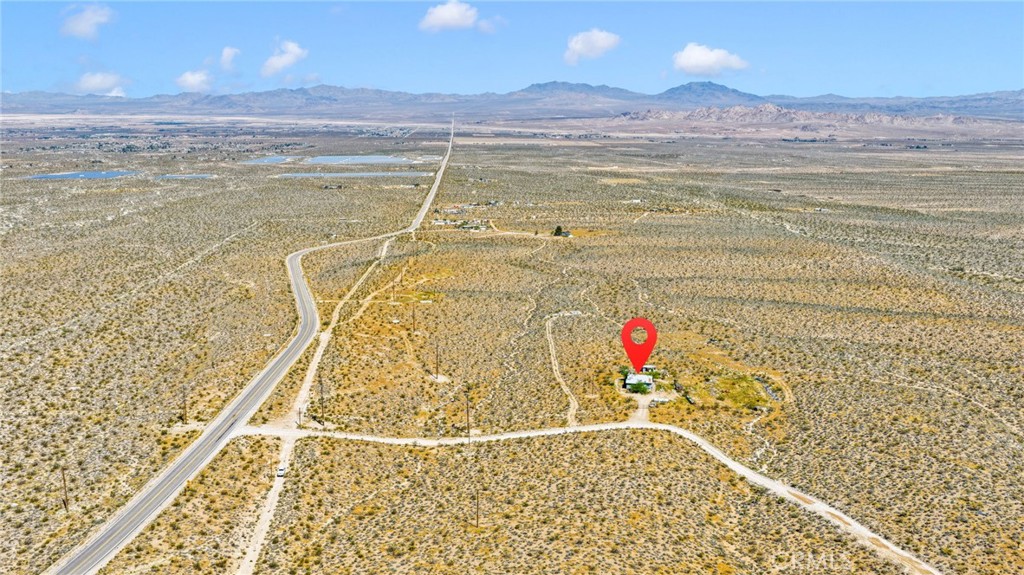 6909 Camp Rock Road Lucerne Valley, CA 92356 - Photo 10 of 11 a view of a swimming pool and an outdoor space