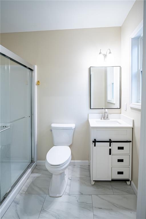 2710 Maple Road Southeast Rome, GA 30161 - Photo 6 of 20 a bathroom with a sink toilet and shower