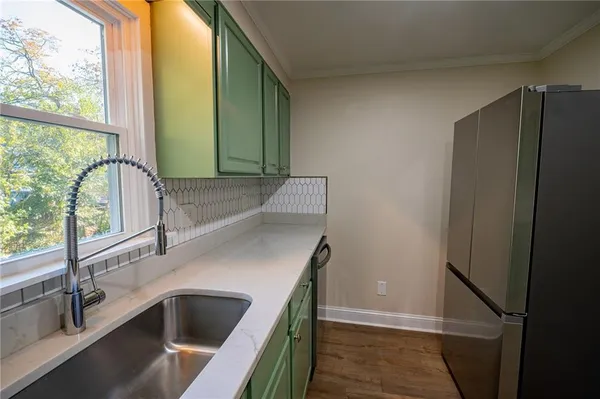 a view of two sink and a window