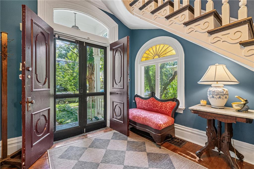 657 Maple Lane Sewickley, PA 15143 - Photo 4 of 50 Stunning entry with double entry doors, sun beam window and hardwood floors.