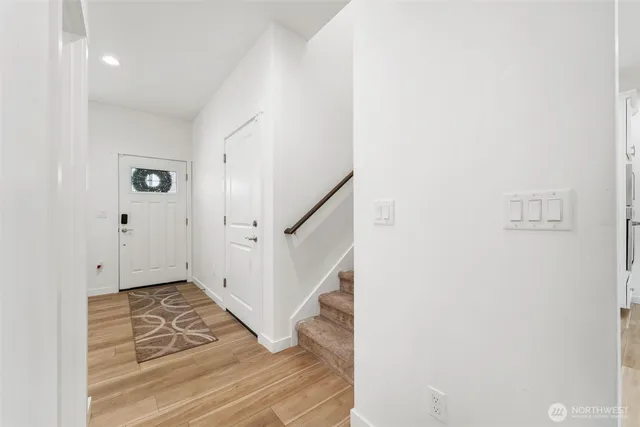 a view of an entryway with staircase