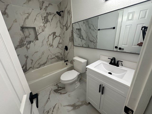 4702 11th Street Brookshire, TX 77423 - Photo 17 of 23 a bathroom with a sink a toilet and a bathtub