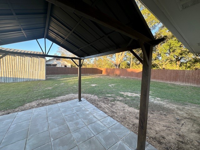 4702 11th Street Brookshire, TX 77423 - Photo 21 of 23 a view of a floor to ceiling window next to a yard