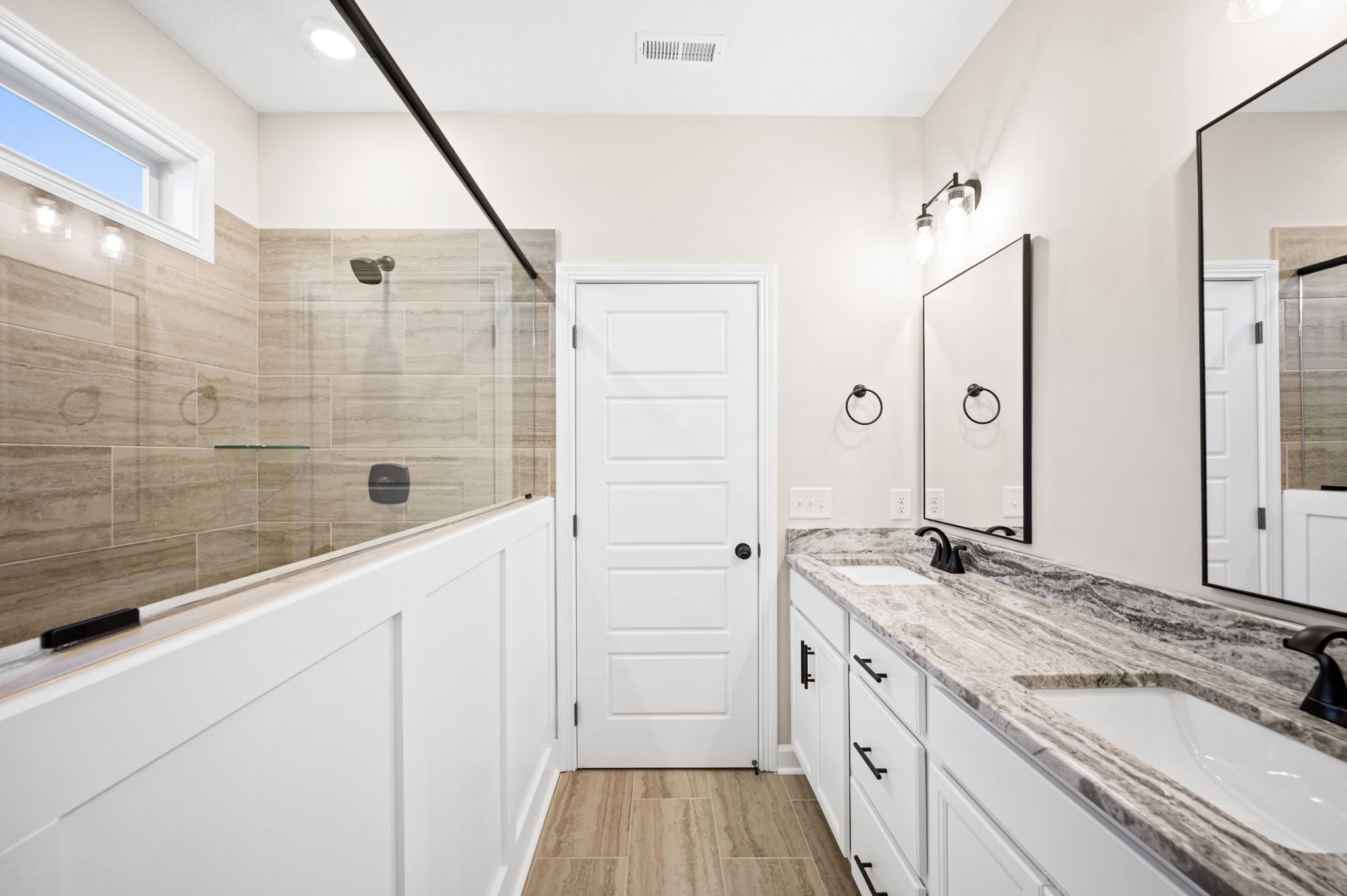 1749 Powell Road Clarksville, TN 37043 - Photo 26 of 50 a bathroom with a granite countertop sink a mirror and shower