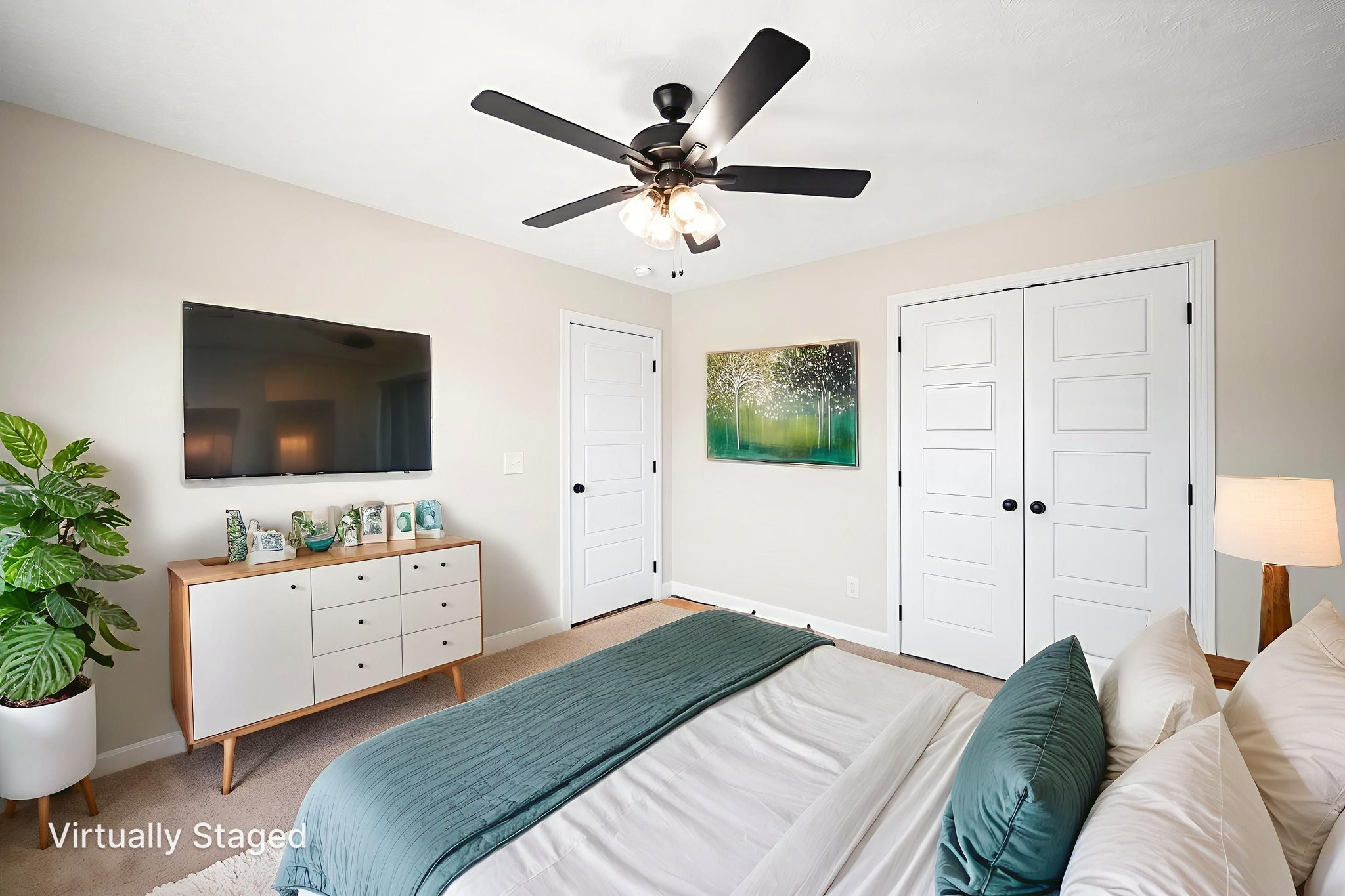 1749 Powell Road Clarksville, TN 37043 - Photo 37 of 50 a bedroom with a bed and a flat screen tv