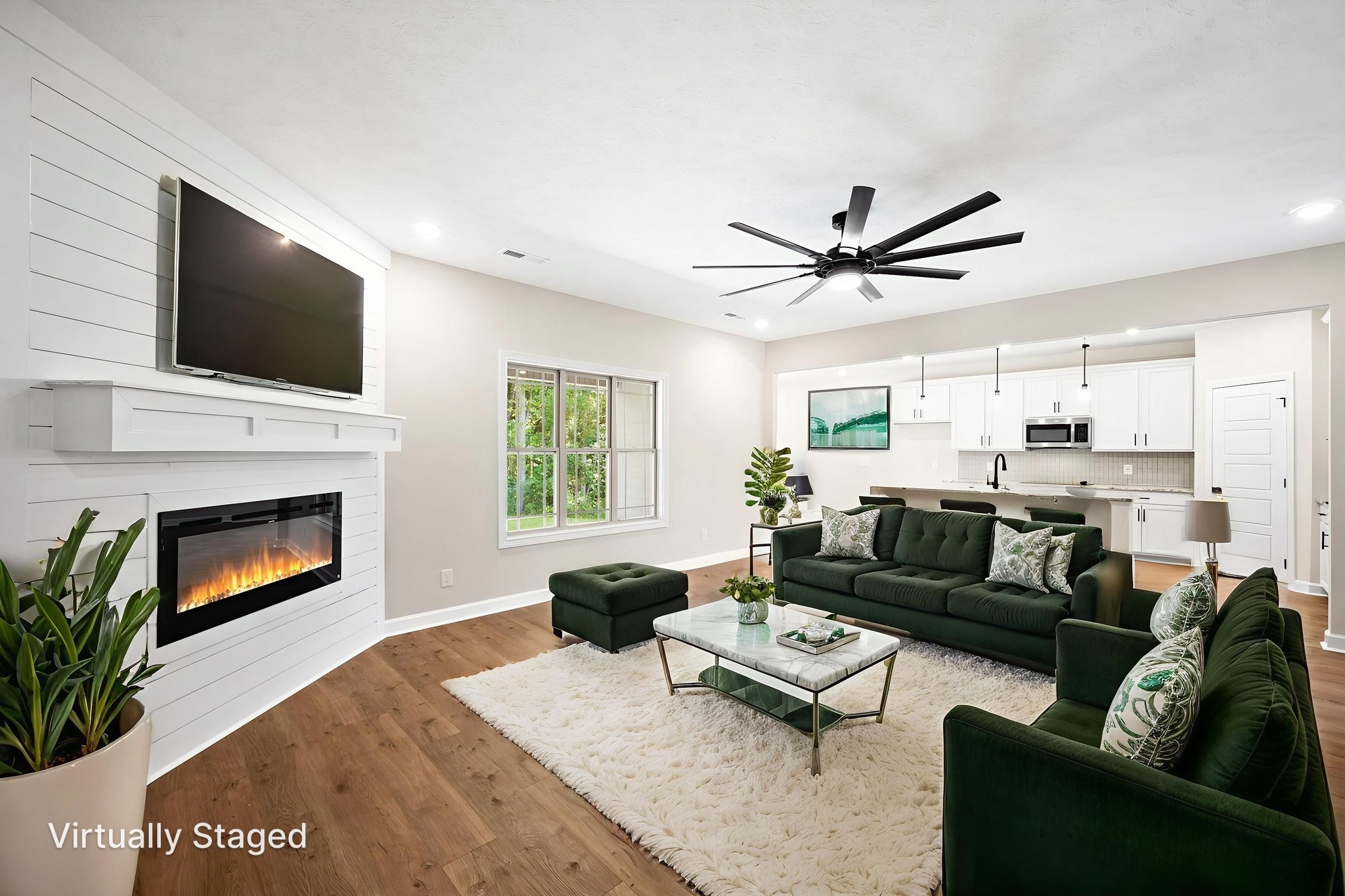 1749 Powell Road Clarksville, TN 37043 - Photo 8 of 50 a living room with furniture fireplace and a flat screen tv