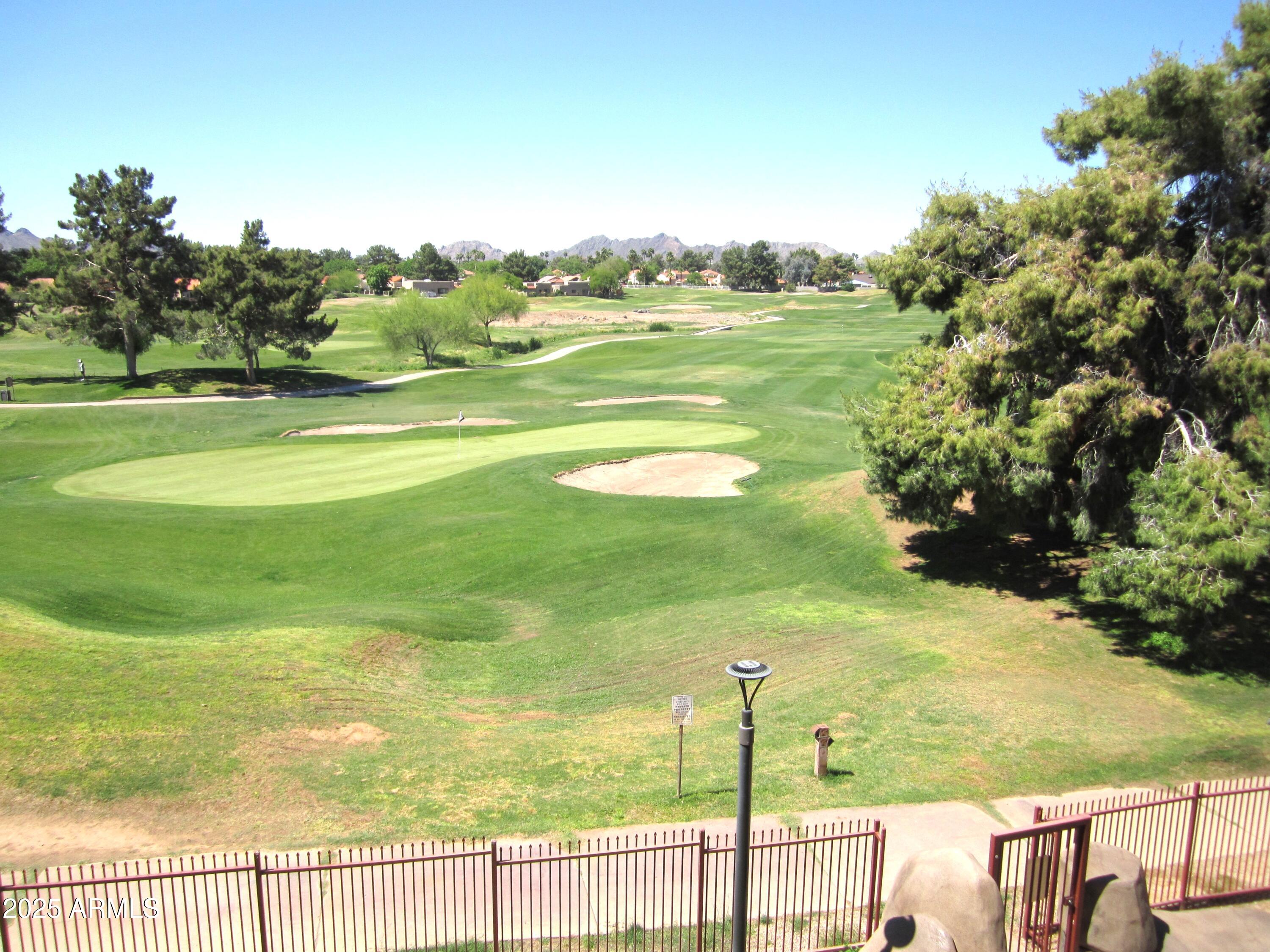 4303 East Cactus Road, Unit 413 Phoenix, AZ 85032 - Photo 23 of 30 a view of an ocean from a balcony
