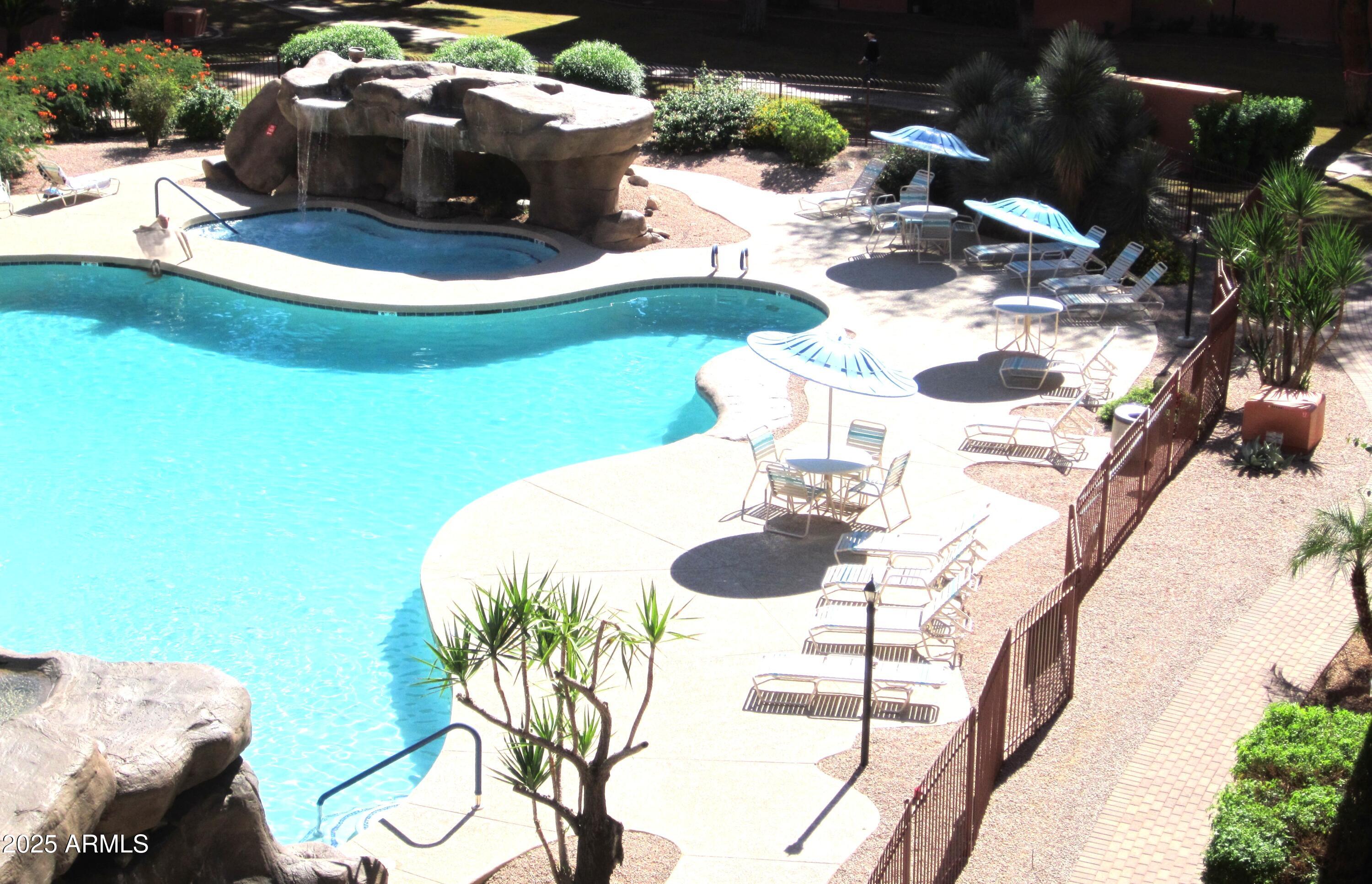 4303 East Cactus Road, Unit 413 Phoenix, AZ 85032 - Photo 5 of 30 a close view of dining table