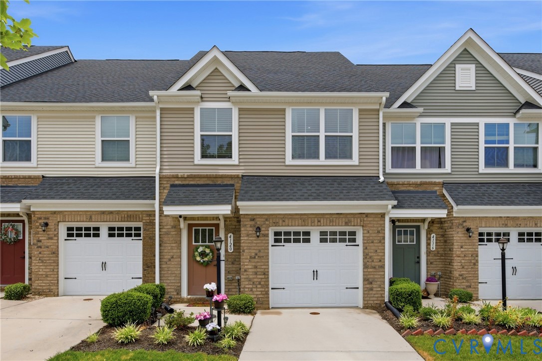 4120 Jefferson Rdg Drive Midlothian, VA 23112 - Photo 2 of 19 Townhome exterior featuring brick and siding facad