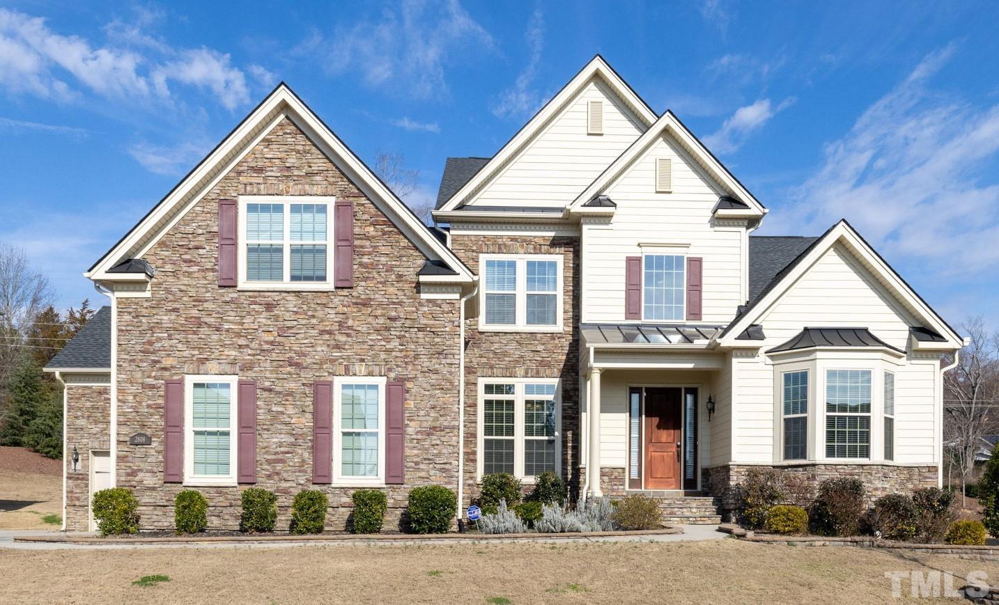 2808 Spring Shade Road Apex, NC 27523 - Photo 1 of 34 a front view of a house with a yard