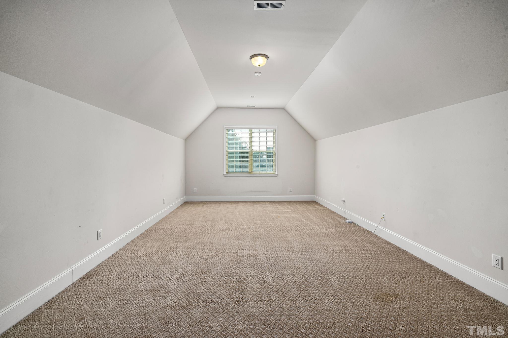 2808 Spring Shade Road Apex, NC 27523 - Photo 31 of 34 an empty room with a window