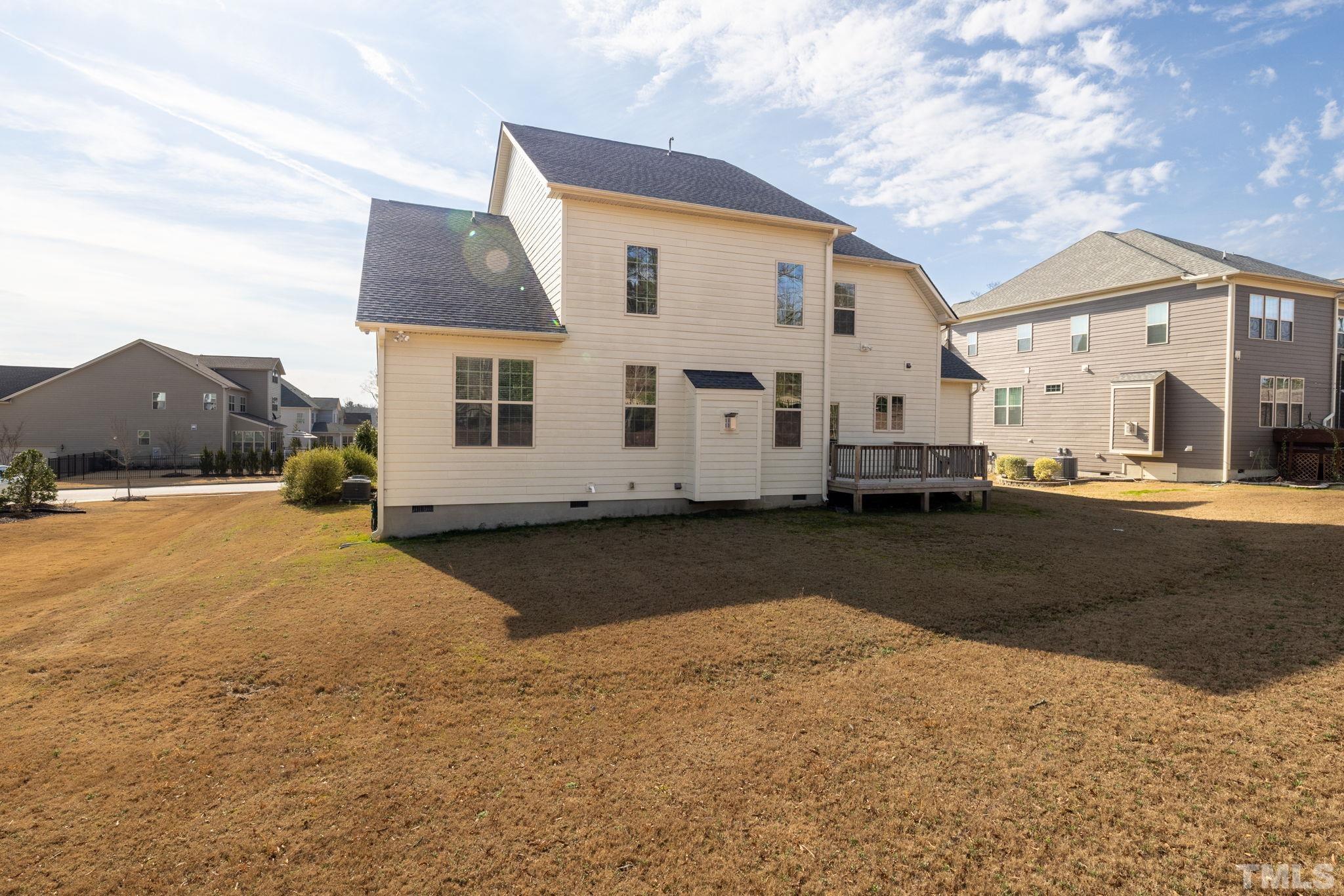 2808 Spring Shade Road Apex, NC 27523 - Photo 34 of 34 a view of a white house with a yard