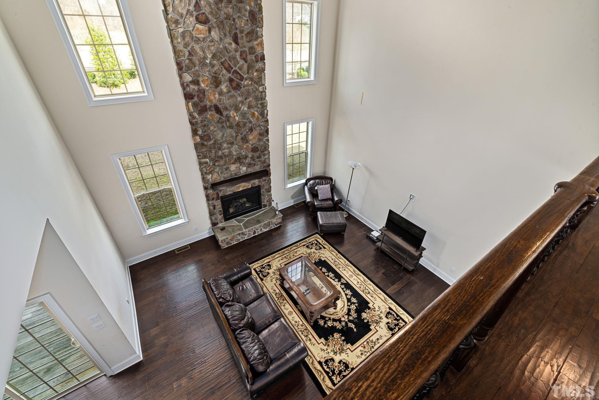 2808 Spring Shade Road Apex, NC 27523 - Photo 10 of 34 a bed sitting in a bedroom next to a window