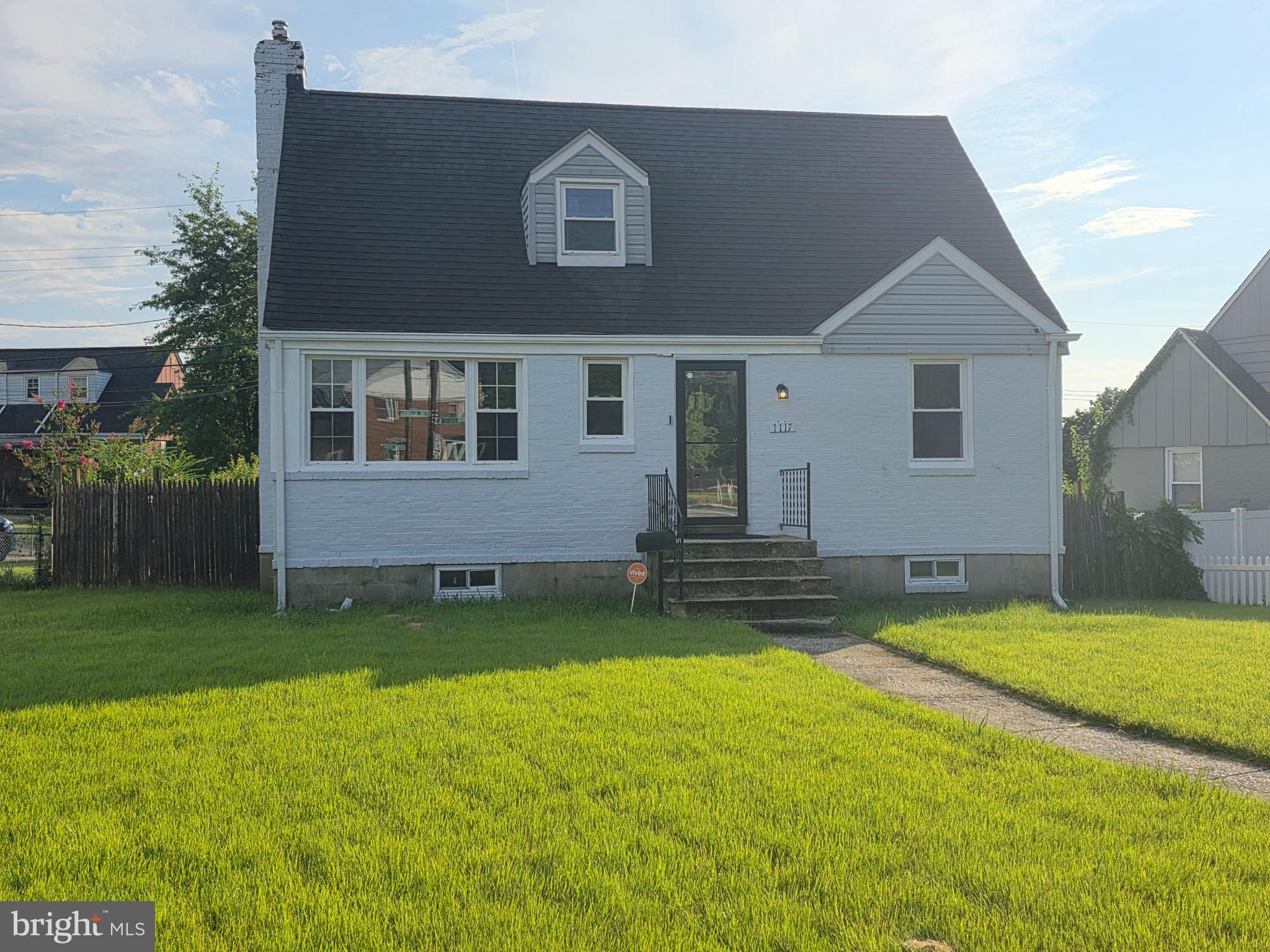 1117 Walker Avenue Baltimore, MD 21239 - Photo 1 of 16 a view of a house with a yard and swimming pool