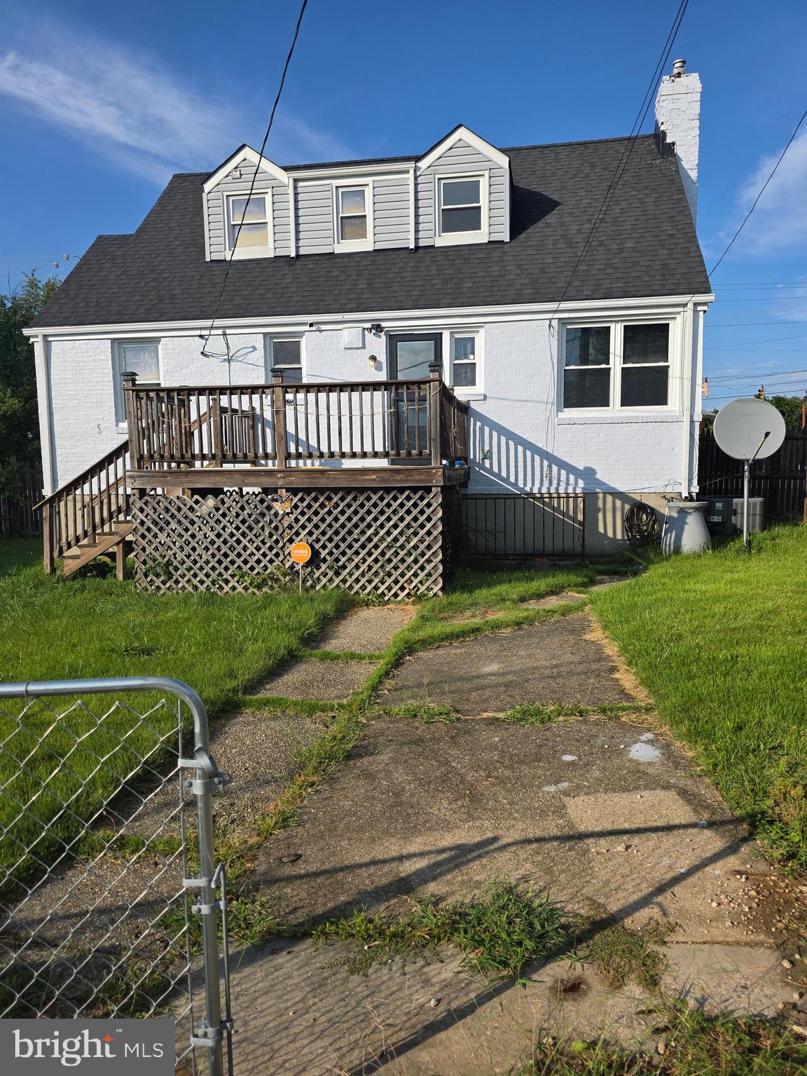 1117 Walker Avenue Baltimore, MD 21239 - Photo 16 of 16 a front view of a house with garden