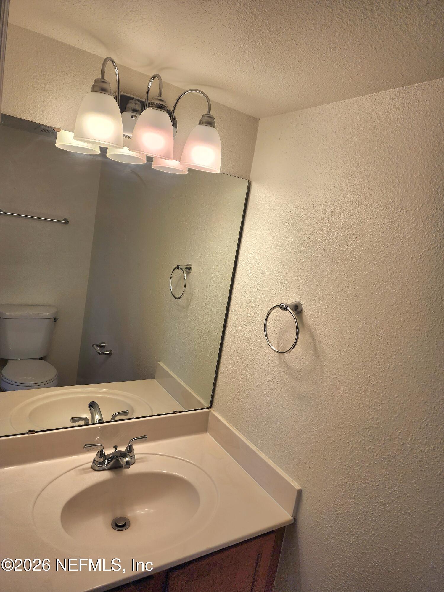 7147 High Bluff Road Jacksonville, FL 32244 - Photo 4 of 16 downstairs half bathroom