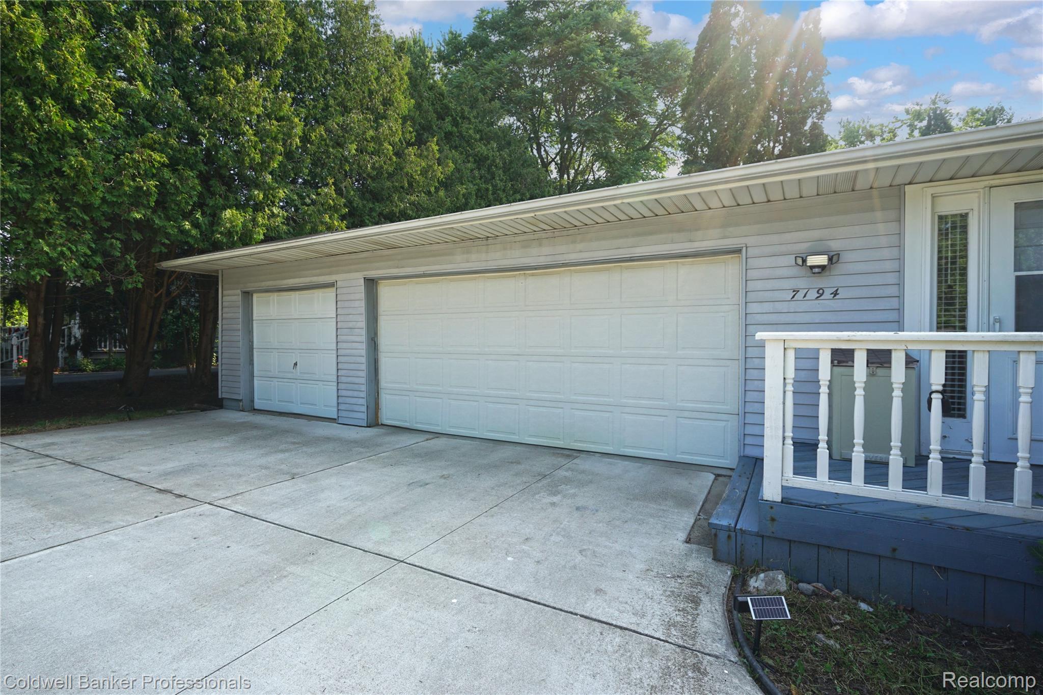 7194 North Center Road Mount Morris, MI 48458 - Photo 4 of 31 3 car garage with lots of parking. Includes 50 amp ev rated Outlet(charger reserved)