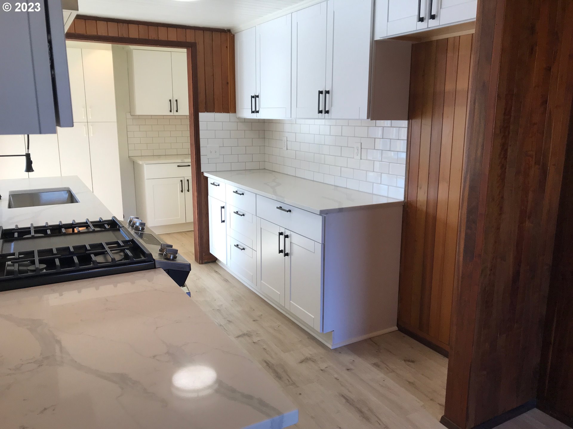 2295 Dakota Street Eugene, OR 97402 - Photo 11 of 17 a kitchen with stainless steel appliances a stove and a refrigerator