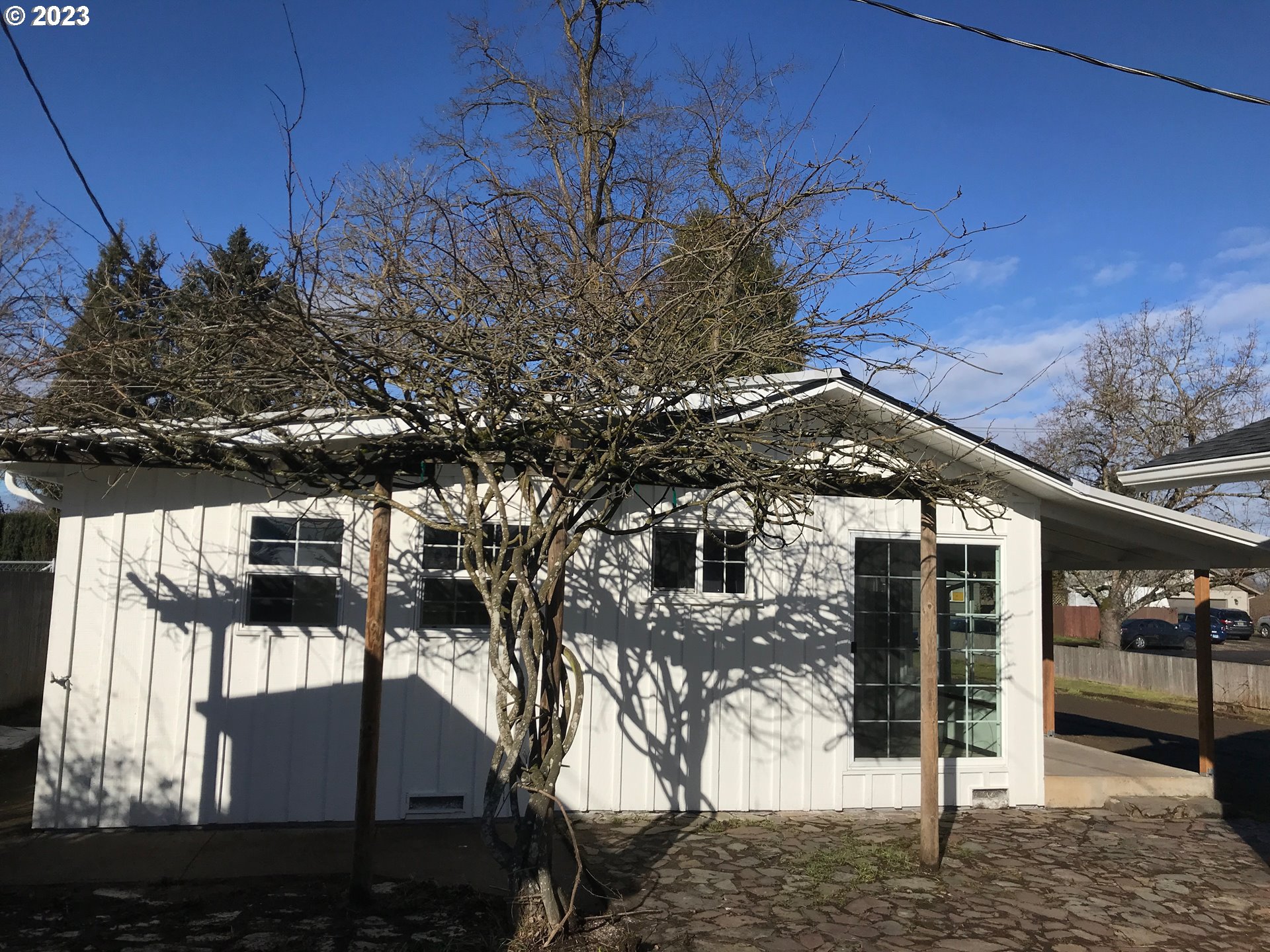 2295 Dakota Street Eugene, OR 97402 - Photo 12 of 17 a view of a house with a tree