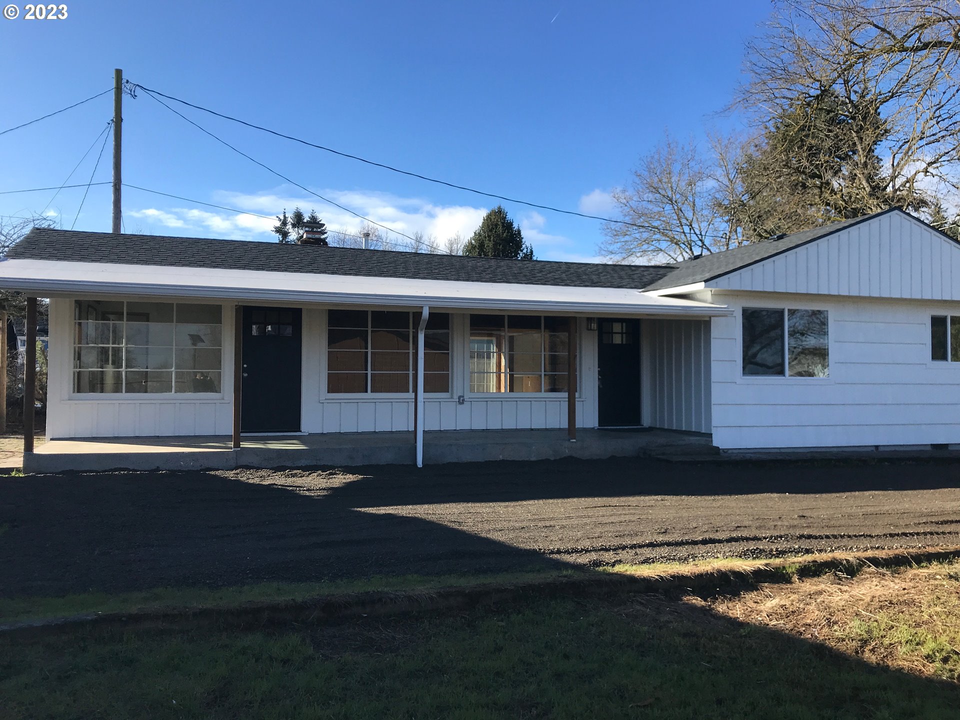 2295 Dakota Street Eugene, OR 97402 - Photo 2 of 17 a front view of a house with a yard