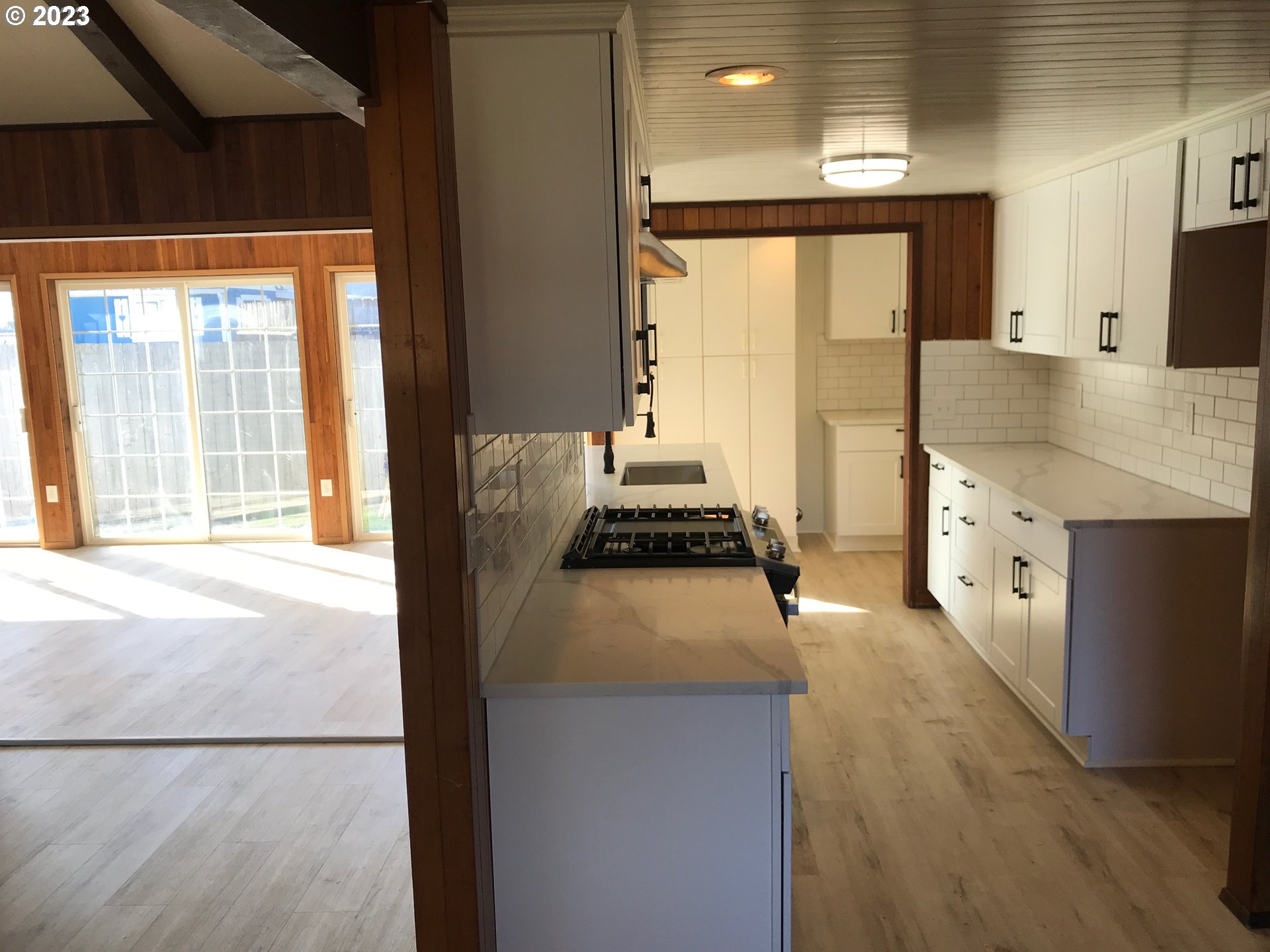 2295 Dakota Street Eugene, OR 97402 - Photo 4 of 17 a kitchen with stainless steel appliances granite countertop a refrigerator a sink and a stove