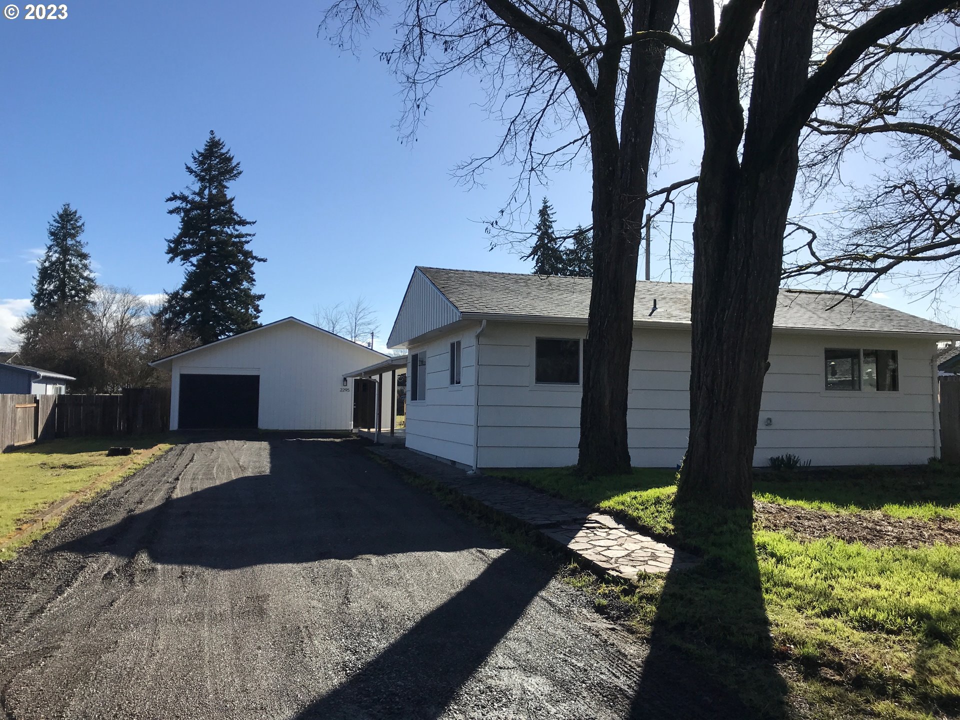 2295 Dakota Street Eugene, OR 97402 - Photo 6 of 17 a front view of a house with a yard