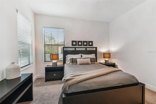 a bathroom with a double vanity sink mirror double shower and a bathtub