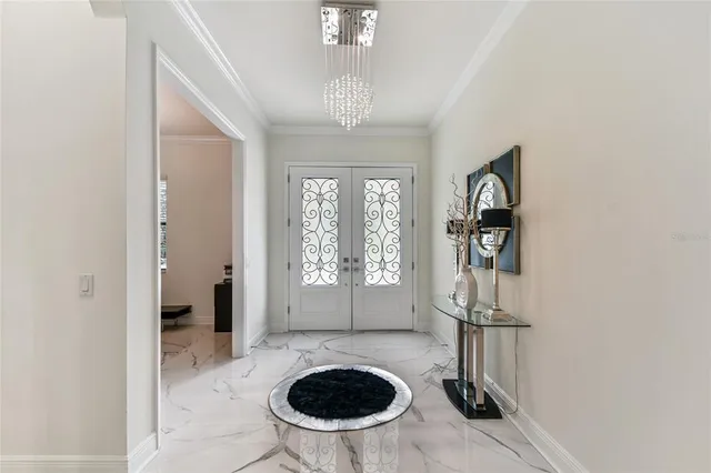 a kitchen with kitchen island stainless steel appliances a sink stove and refrigerator