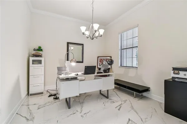 a kitchen with stainless steel appliances kitchen island granite countertop a refrigerator and a stove top oven