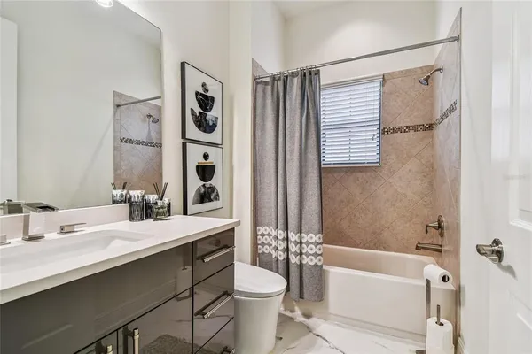 a kitchen with stainless steel appliances kitchen island granite countertop a sink and cabinets