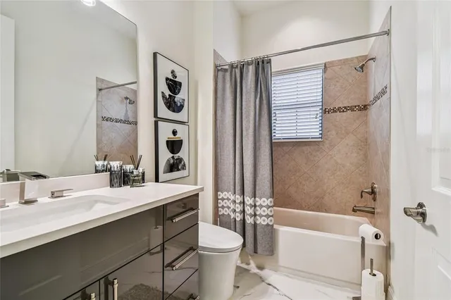 a kitchen with stainless steel appliances kitchen island granite countertop a sink and cabinets