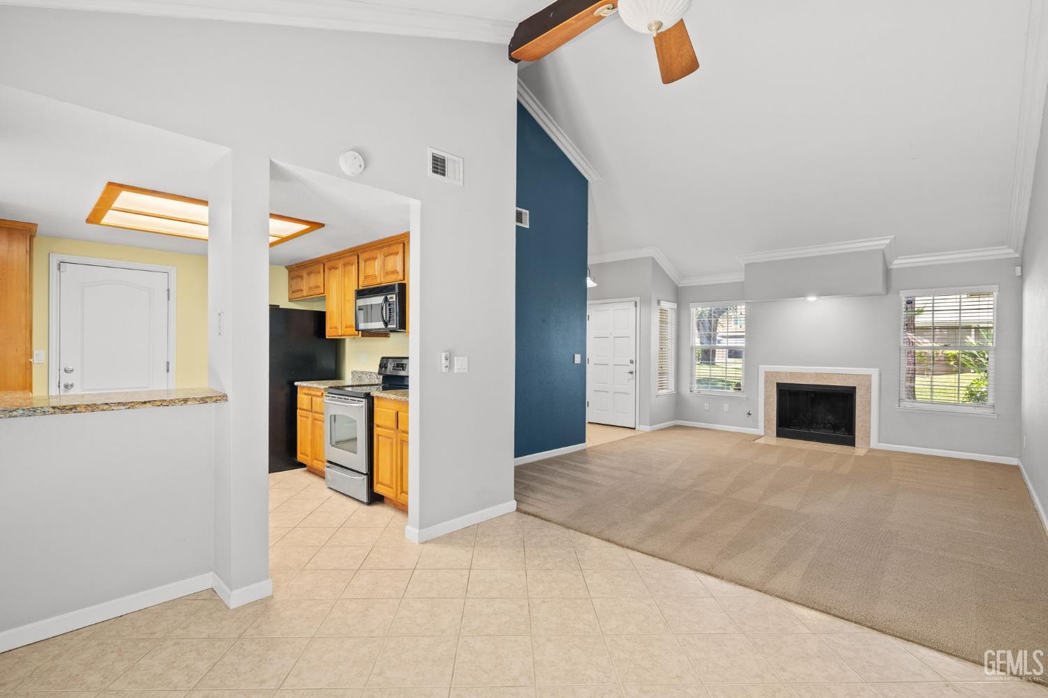 Undisclosed Address Bakersfield, CA 93309 - Photo 15 of 42 a view of a livingroom with a fireplace