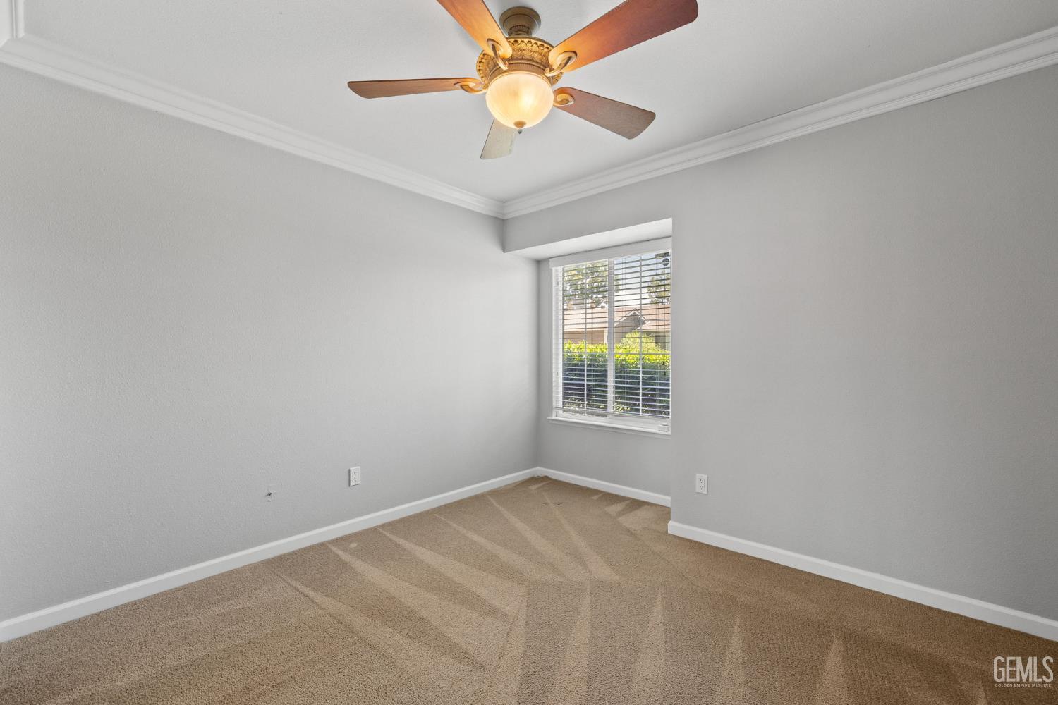 Undisclosed Address Bakersfield, CA 93309 - Photo 34 of 42 an empty room with windows and fan