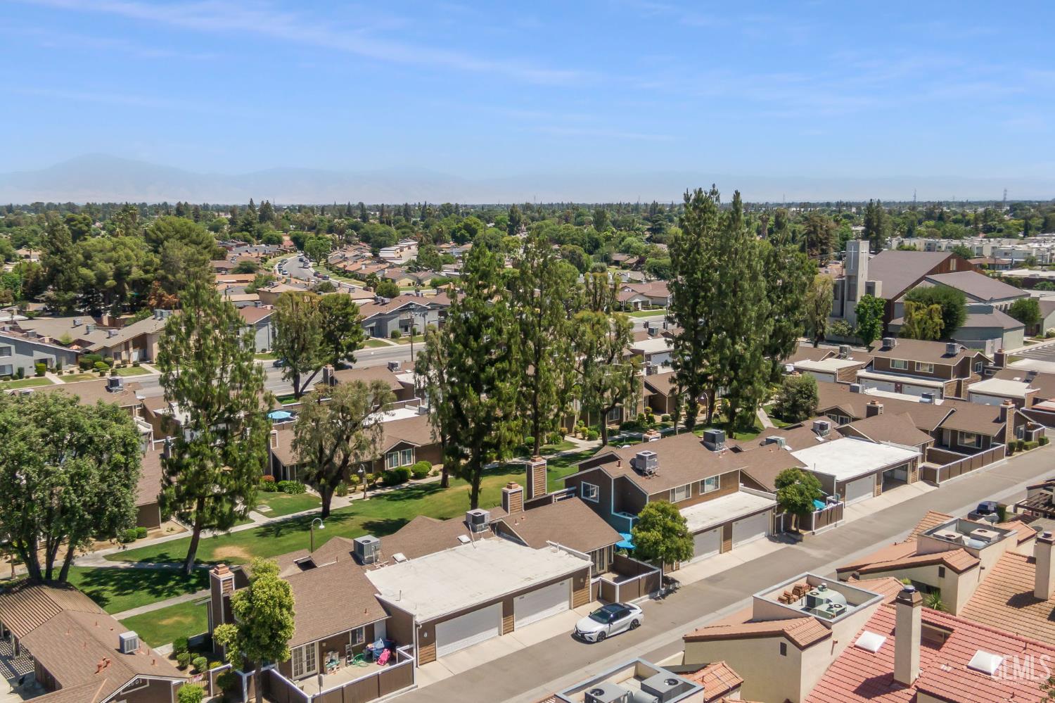 Undisclosed Address Bakersfield, CA 93309 - Photo 39 of 42 an aerial view of a house with a yard