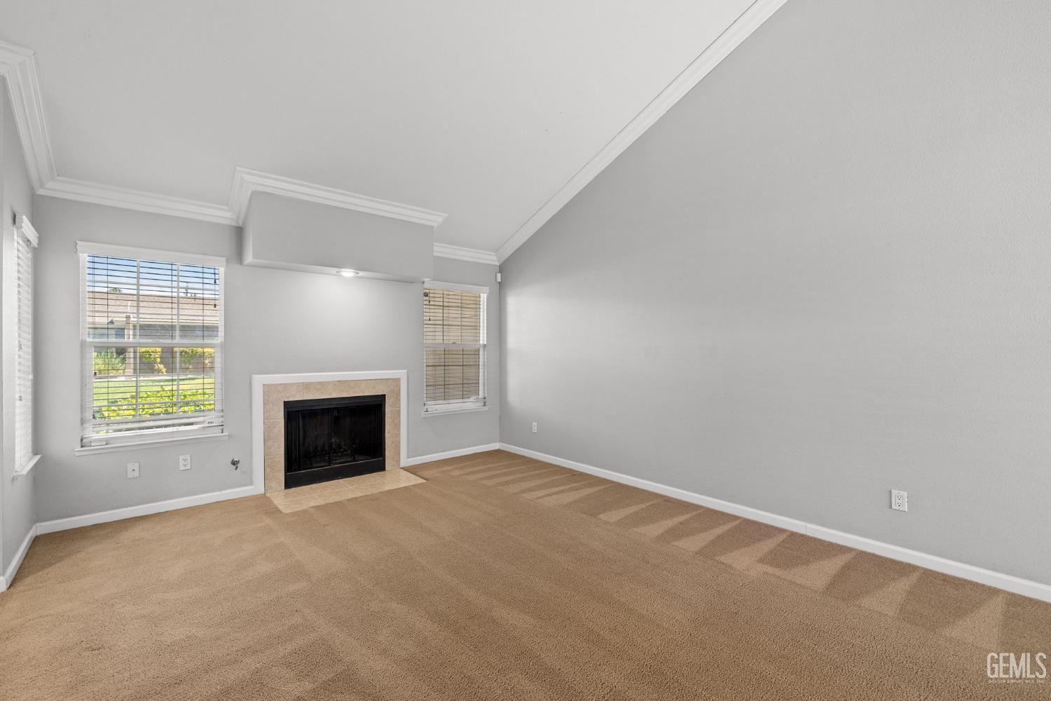 Undisclosed Address Bakersfield, CA 93309 - Photo 9 of 42 a view of empty room with a fireplace