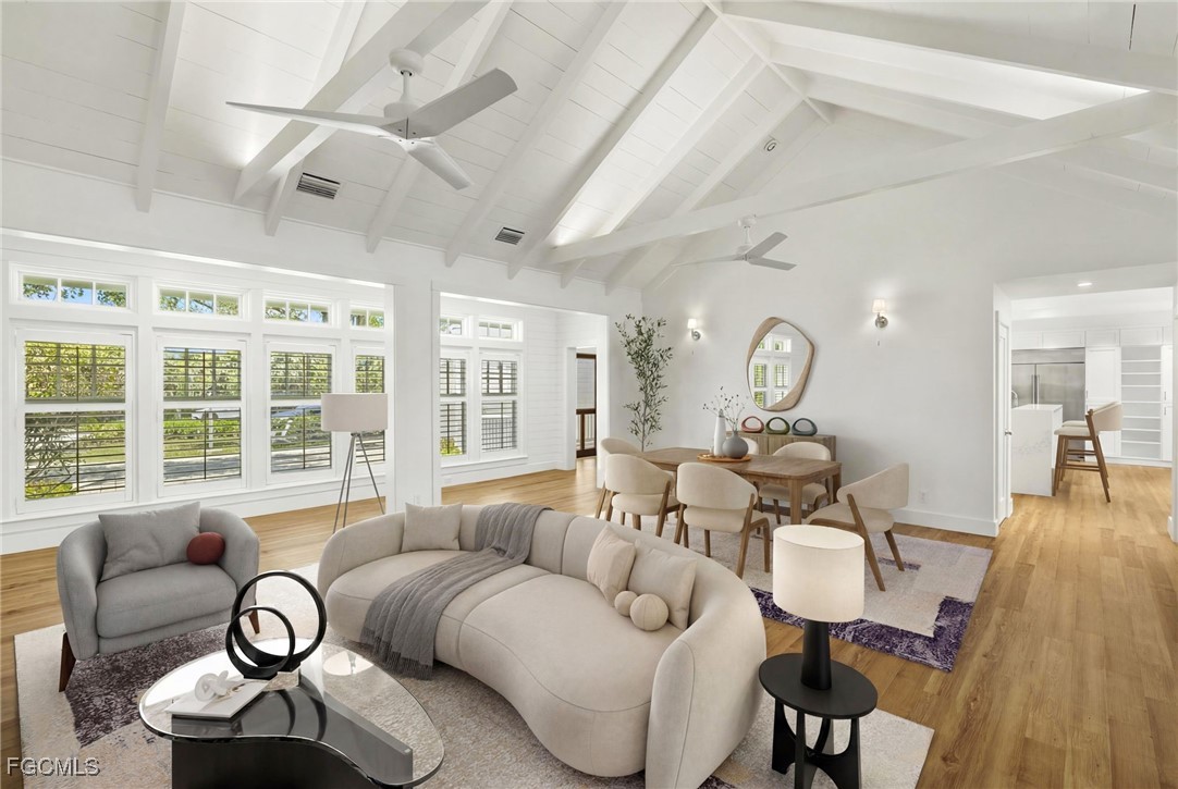 1517 Sand Castle Road Sanibel, FL 33957 - Photo 11 of 50 a living room with furniture and a large window