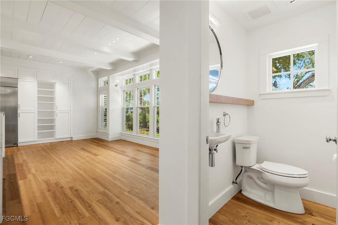 1517 Sand Castle Road Sanibel, FL 33957 - Photo 12 of 50 a bathroom with a toilet sink and a window