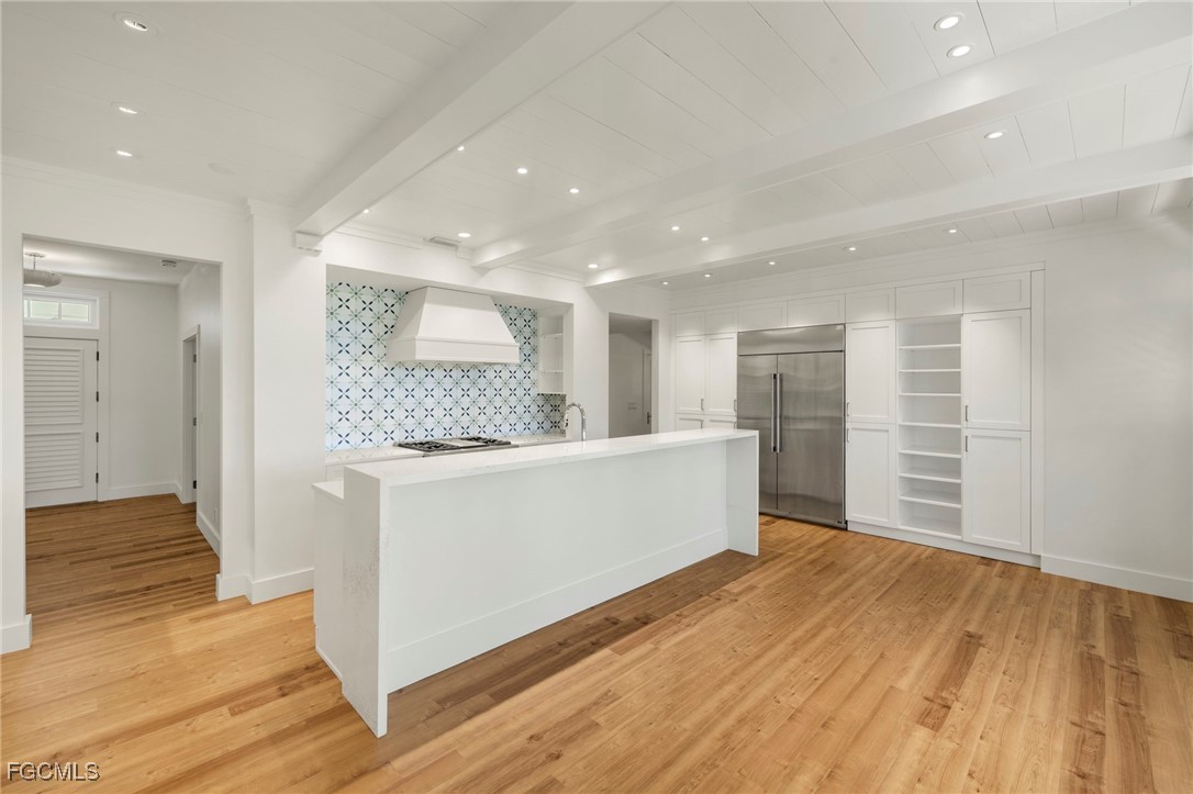 1517 Sand Castle Road Sanibel, FL 33957 - Photo 14 of 50 a large space with a lot of wooden floor and entryway