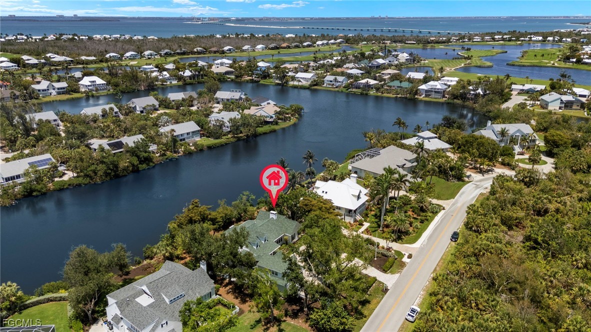 1517 Sand Castle Road Sanibel, FL 33957 - Photo 2 of 50 an aerial view of lake residential house with outdoor space