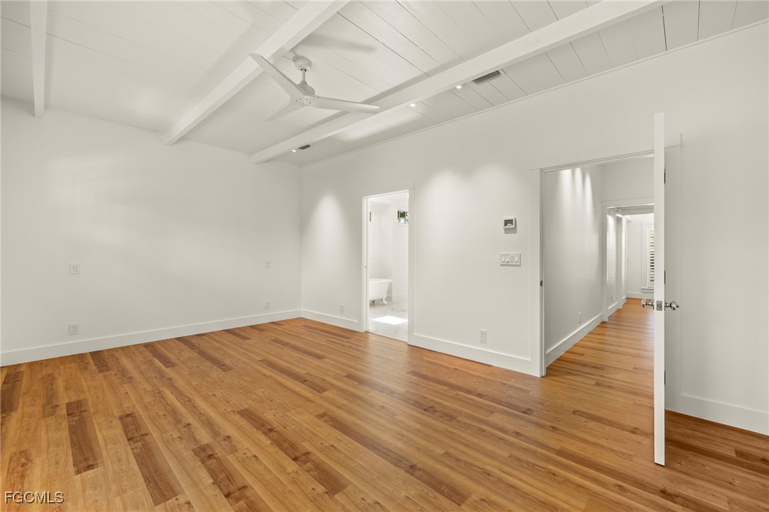 1517 Sand Castle Road Sanibel, FL 33957 - Photo 21 of 50 a view of an empty room with wooden floor
