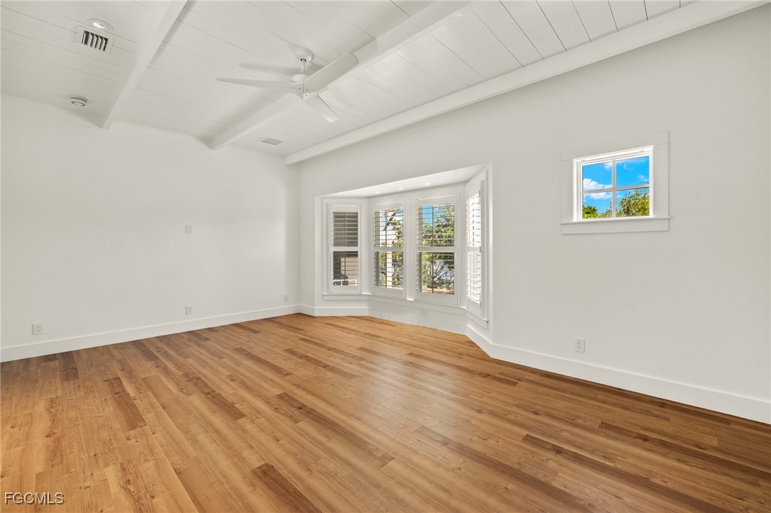 1517 Sand Castle Road Sanibel, FL 33957 - Photo 22 of 50 a view of an empty room with wooden floor and a window