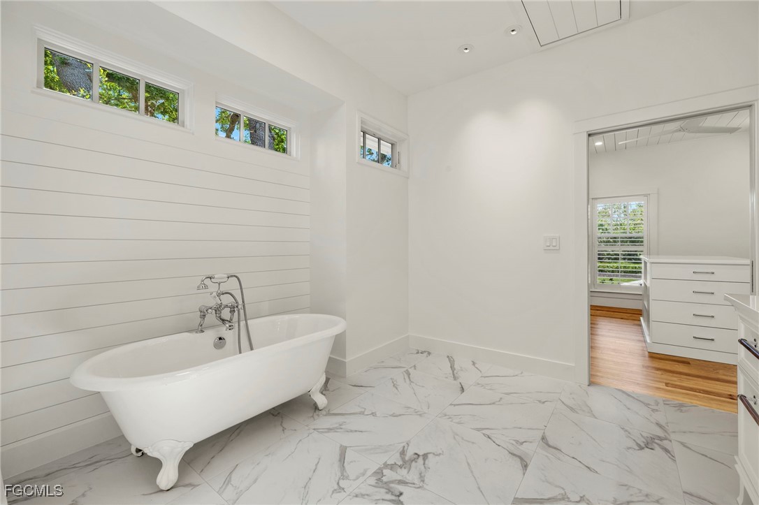 1517 Sand Castle Road Sanibel, FL 33957 - Photo 28 of 50 a bathroom with a sink and a bathtub