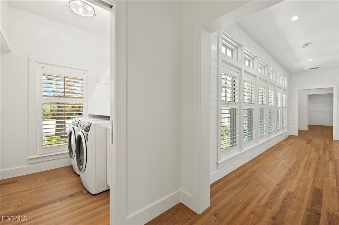 1517 Sand Castle Road Sanibel, FL 33957 - Photo 32 of 50 a view of a room with wooden floor and balcony