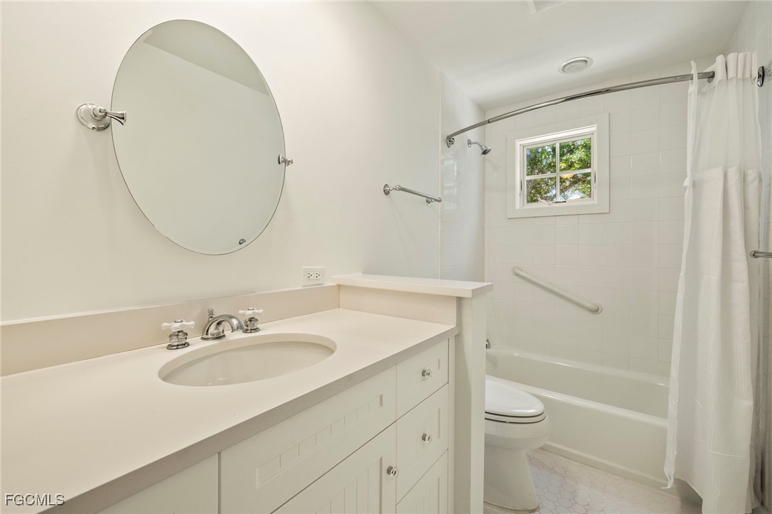 1517 Sand Castle Road Sanibel, FL 33957 - Photo 34 of 50 a bathroom with a sink toilet and shower