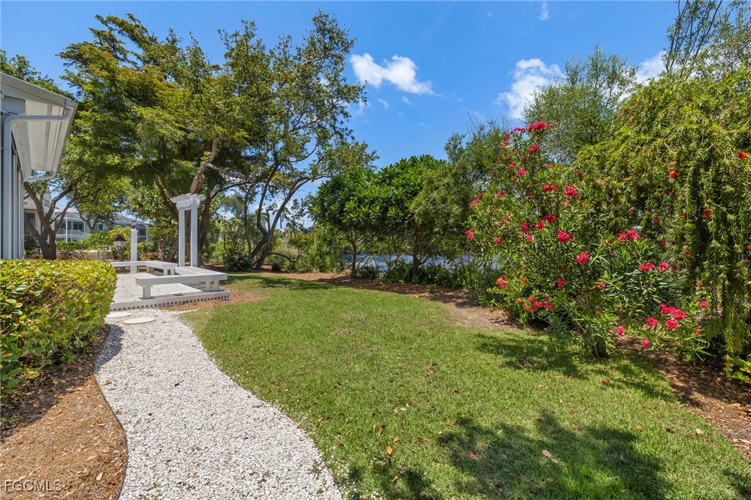 1517 Sand Castle Road Sanibel, FL 33957 - Photo 38 of 50 a view of a garden with flowers