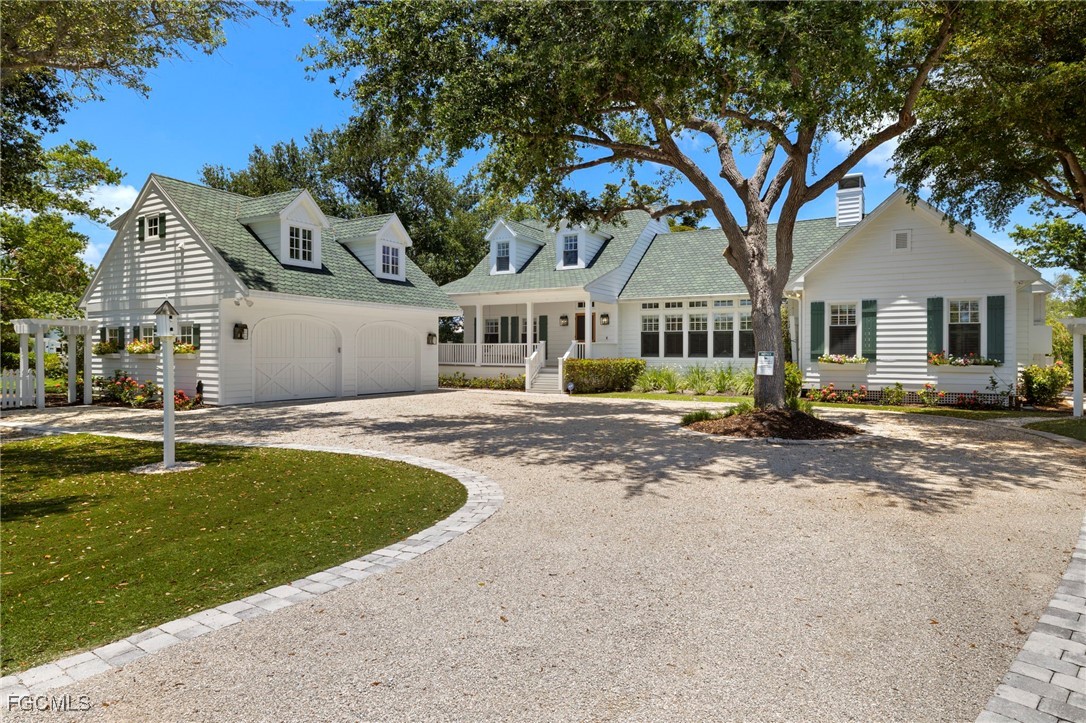 1517 Sand Castle Road Sanibel, FL 33957 - Photo 41 of 50 a front view of a house with swimming pool