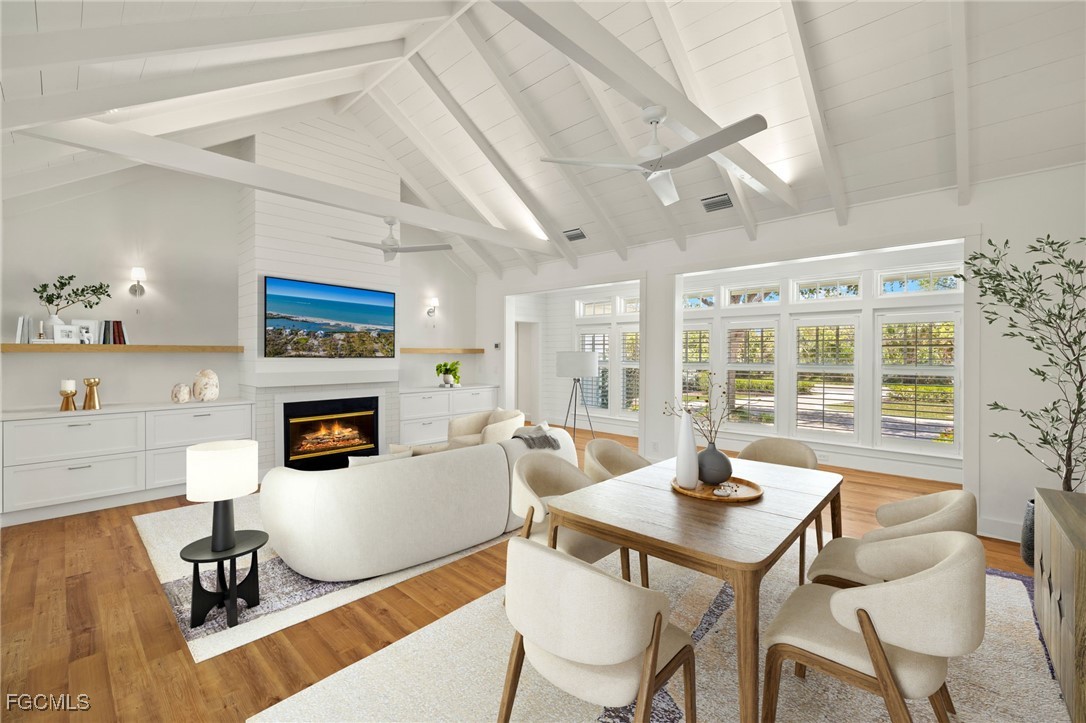 1517 Sand Castle Road Sanibel, FL 33957 - Photo 6 of 50 a living room with furniture and a table