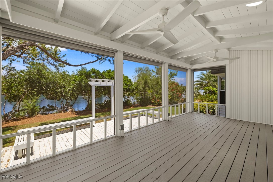 1517 Sand Castle Road Sanibel, FL 33957 - Photo 8 of 50 a view of a porch with wooden floor and outdoor space